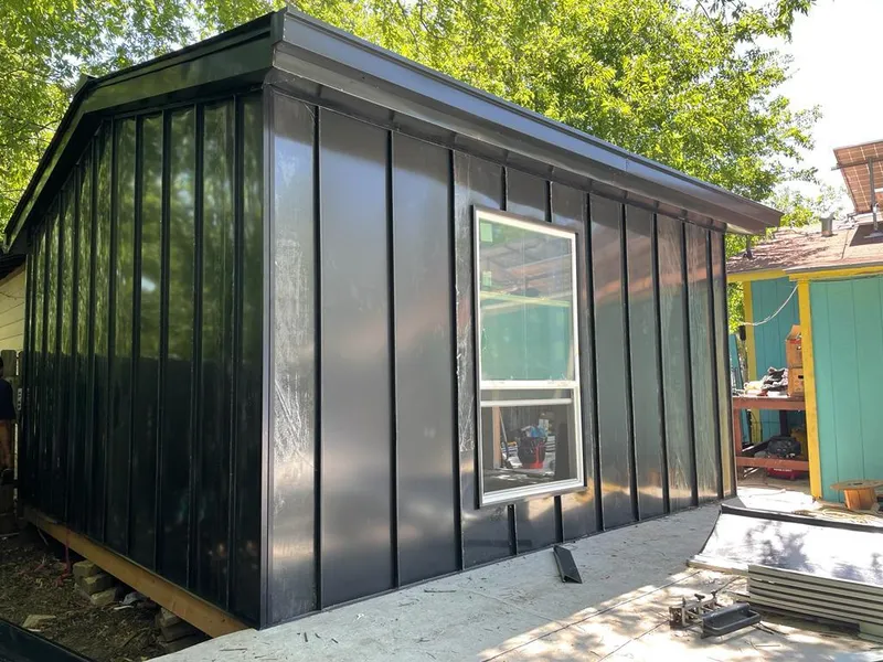 Black standing seam metal wall panels for Metal Roof Installation in Kendallville