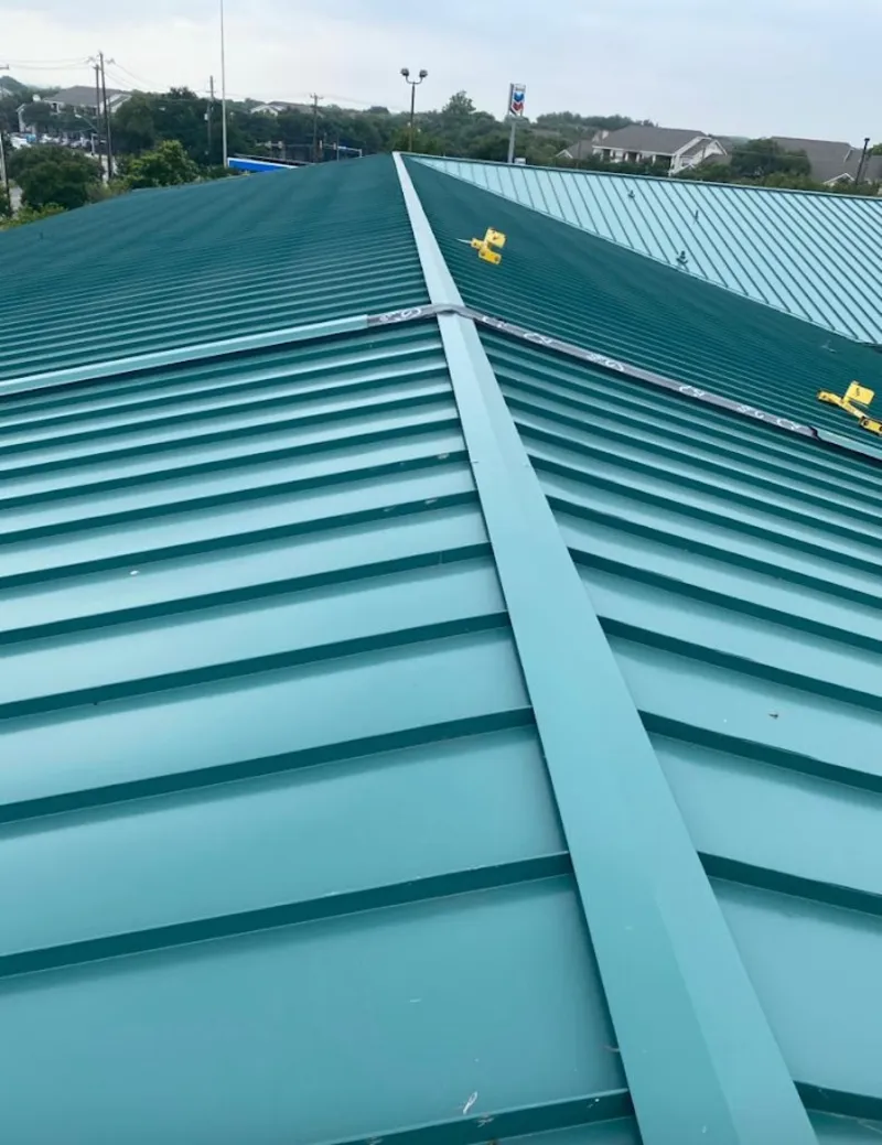 Green commercial metal roof ridge and valley for Metal Roof Repair in Kendallville